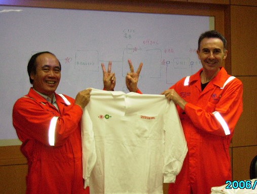 FBPC President and Vice President present workers with shirts to celebrate a safe working milestone